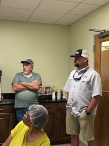 Two men in kitchen